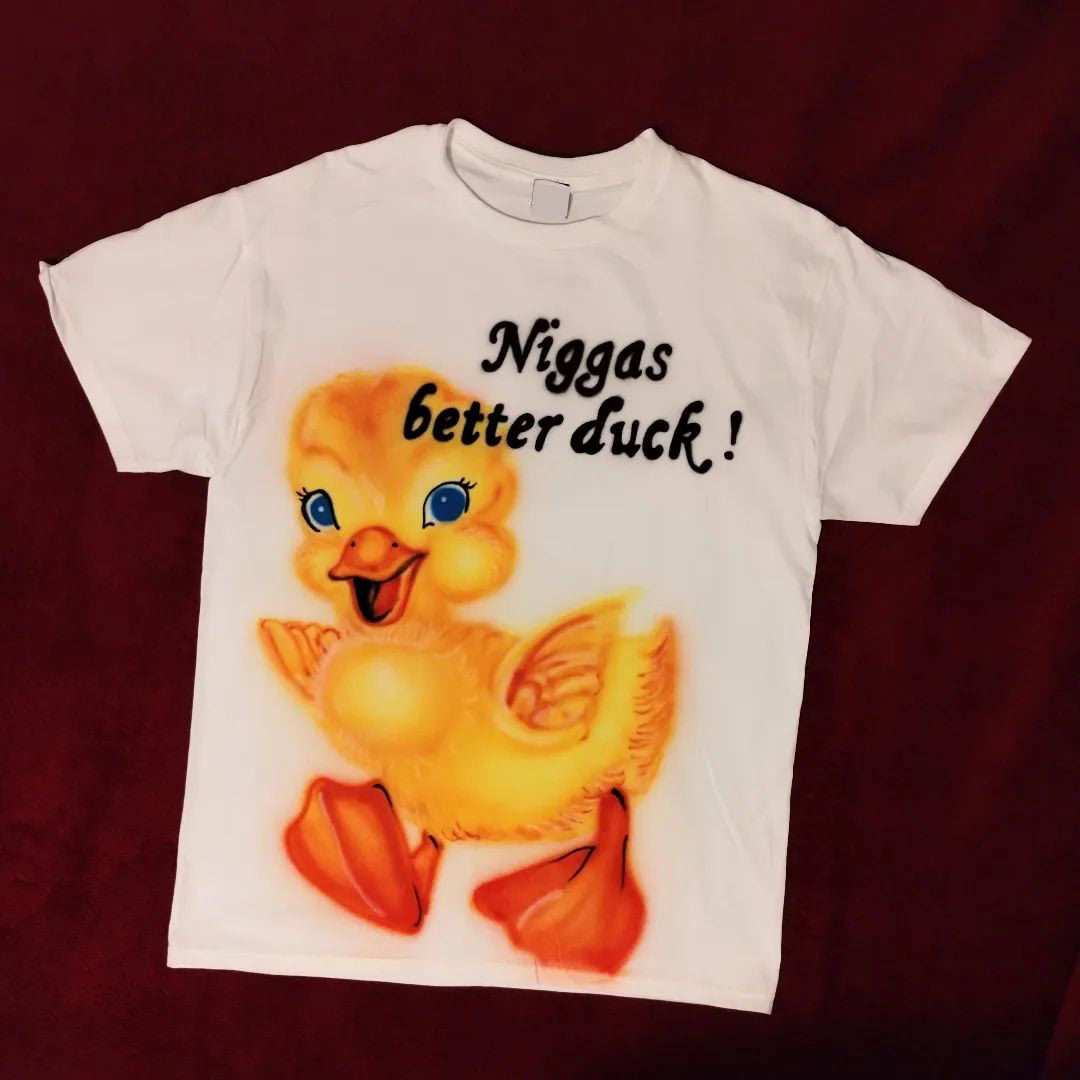 Niggas Better Duck Graphic Print Cotton T-Shirt